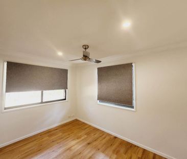 Dual-Living 5-Bedroom Home in North Maclean - Photo 5