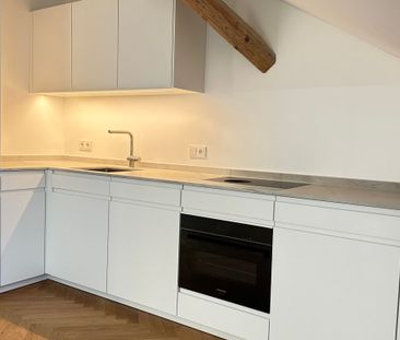 Traumhafte 2-Zimmer-Dachgeschosswohnung in neu renovierter Villa in... - Foto 4