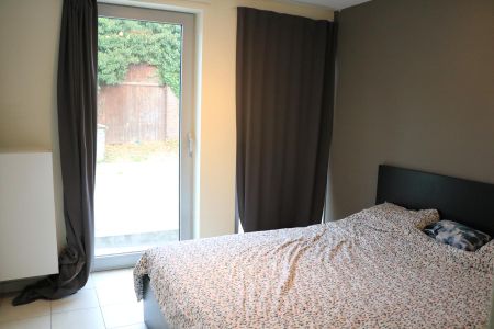 Gelijkvloers appartement met 1 kamer, bureau en tuin - Photo 4