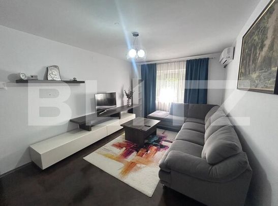 Apartament 3 camere decomandat, 70 mp, centrala, AC, zona 1 Mai - Helin Ciuperca - Photo 1