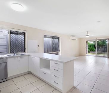 Inviting 4-Bedroom Residence with Modern Comforts - Photo 2