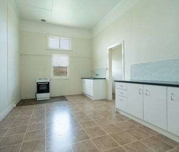 Easy-Care Unit Living in Established Harristown! - Photo 2