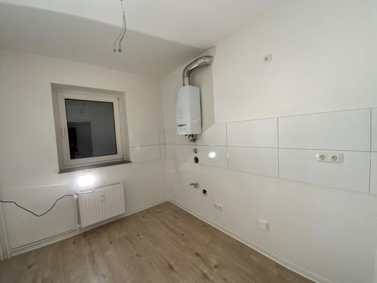 In bester Stadtnähe: Helle Wohnung mit Balkon frei! - Photo 1