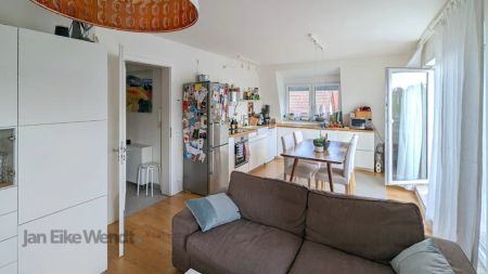 Schöne Dachgeschosswohnung mit großem Südwest-Balkon - Foto 2