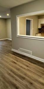 Beautifully Renovated 3-Bedroom Bungalow main floor unit - Photo 3