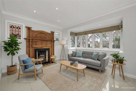 A well-presented family home with period charm, modern interiors, and spacious accommodation arranged over three floors. - Photo 2