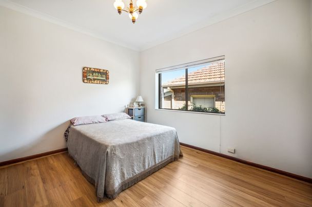 Spacious Full-Brick Home with Large Garage and Prime Punchbowl Location - Photo 1