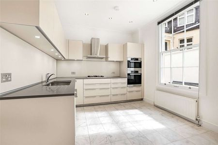 A beautifully presented home with spacious open-plan reception room and a gorgeous private garden. - Photo 5