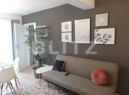 Cauti un apartament cu gradina, parcare, sa fie intr-un bloc nou si mobilat modern? Ai gasit oferta! - Fotografie 5