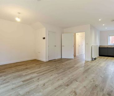 A four bedroom detached family home with a garage and garden - Photo 3