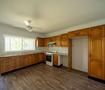 Rare Find! Solid Double Brick Two-Storey 4-Bedroom Family Home with... - Photo 3