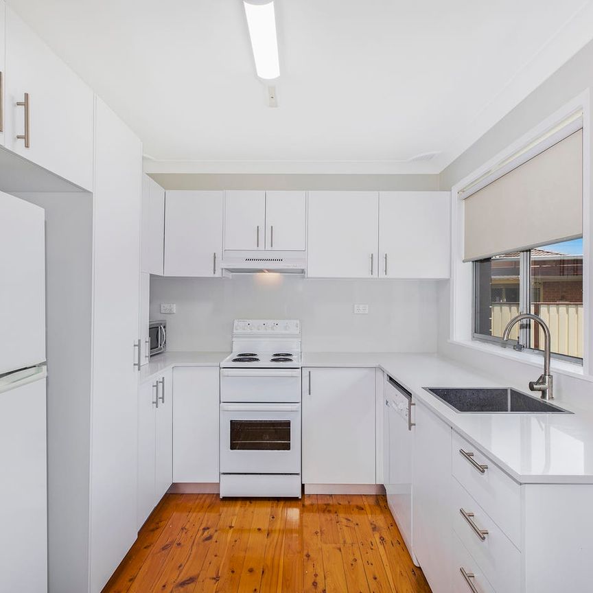 Immaculately Presented Beachside Cottage - Photo 1