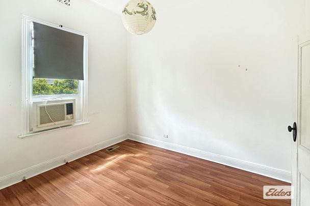 THREE BEDROOM CLOSE TO SCHOOLS AND DAYCARE - Photo 1