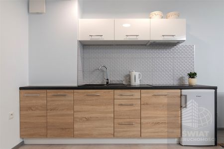 Atrakcyjna kawalerka w nowoczesnym budynku - Photo 5