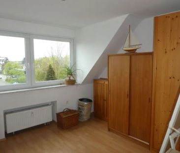 Hübsche 2-Zimmer-Dachgeschoss-Wohnung im Herzen von Asberg - Photo 1