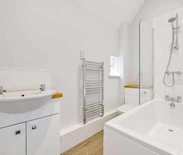 A recently updated first floor apartment located on the Marlow High... - Photo 5