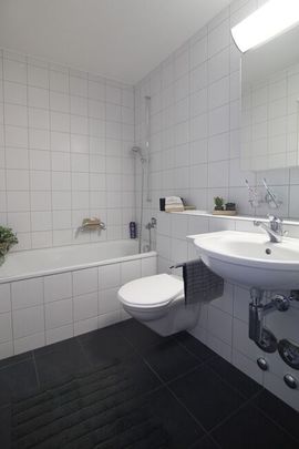 Modern 4.5-room apartment in a quiet residential area - Photo 1