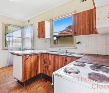 Neat 3 Bedroom Home with Large Yard - Photo 4