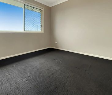 Spacious High Set Family Home with Multiple Living Areas & Moreton ... - Photo 5