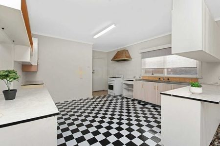 Register to Inspect / Spacious 4-Bedroom Home with Large Backyard in Prime Location - Photo 2