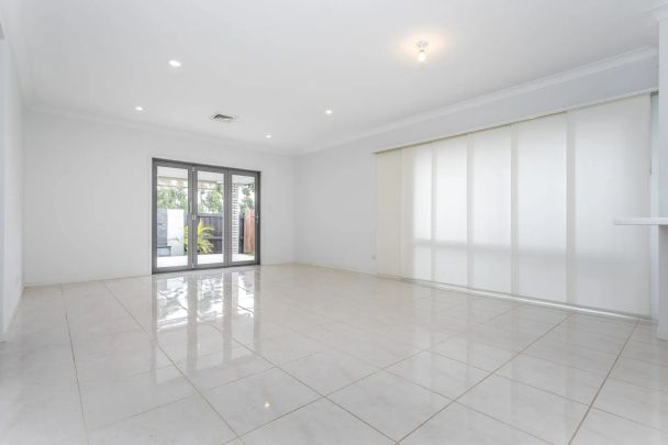 Modern, Low-Maintenance Living in a Prime North Lakes Location - Photo 1