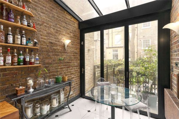 A 'key' Grade II listed part stucco fronted house, located just off Onslow Gardens. - Photo 1