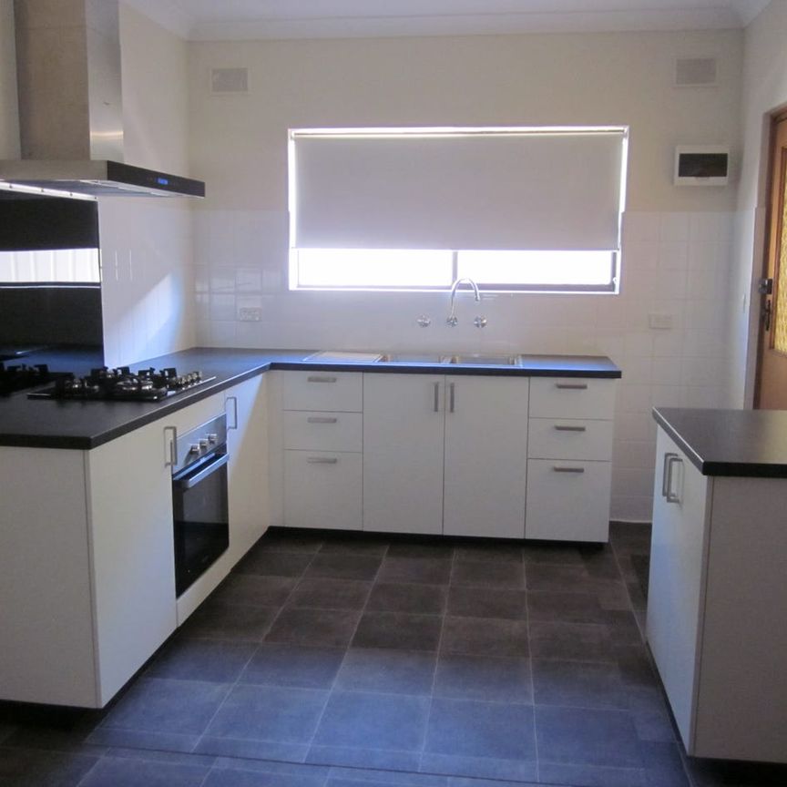 UPDATED UNIT - GROUP OF 3 - CONVENIENT LOCATION - Photo 1