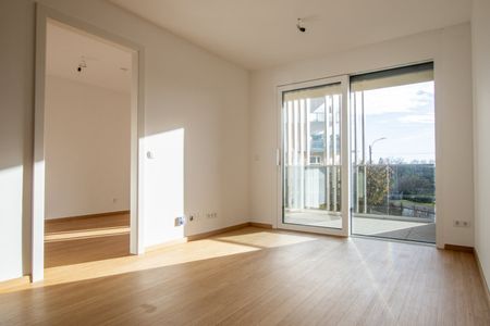 Sonnige Neubauwohnung mit großem Balkon und TG! - Foto 5