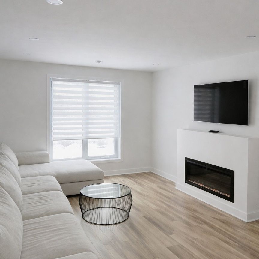 Maison à étages à Bois-des-Filion - Photo 1