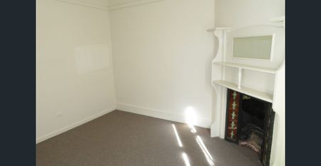 CENTRAL AND RENOVATED 2 BEDROOM SEMI! - Photo 3