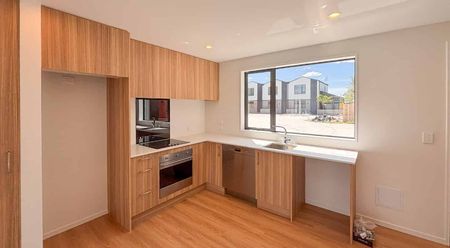 Sleek Two Bedroom Townhouse! - Photo 2