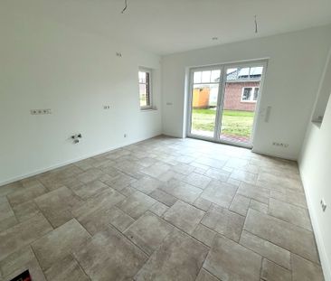 Neubauwohnung im Erdgeschoss mit großer Garage und Garten - Foto 2