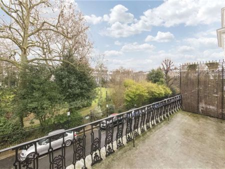 This is a charming one bedroom flat, situated in a period conversion on a very popular garden square in South Kensington. The property also benefits from a roof terrace. - Photo 2