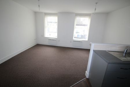 ****Available NOW*** PROPERTY OPTIONS are pleased to offer a first floor one bedroom flat ideally located to the city centre Large open plan lounge/kitchen Lounge having electric heaters. Kitchen with breakfast bar, electric oven, hob and extractor fan, and fridge included in the flat. - Photo 3