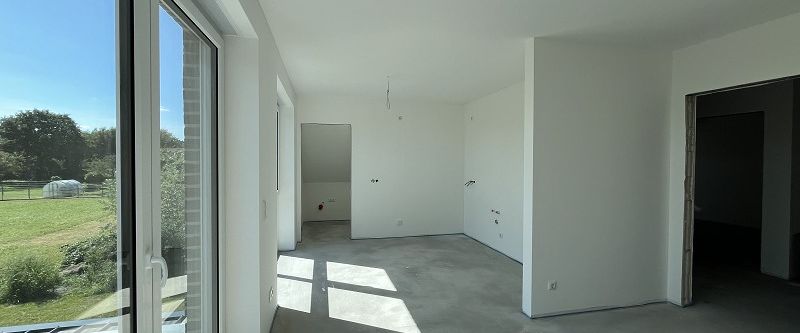 Vermietung: Erstbezug, moderne Obergeschosswohnung mit Balkon und Carport in Westoverledingen - Foto 1