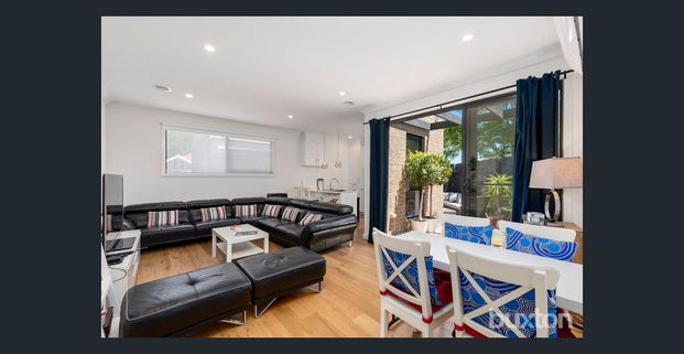 Prestige Beachside 4-Bedroom Townhouse with Contemporary Luxury - Photo 1