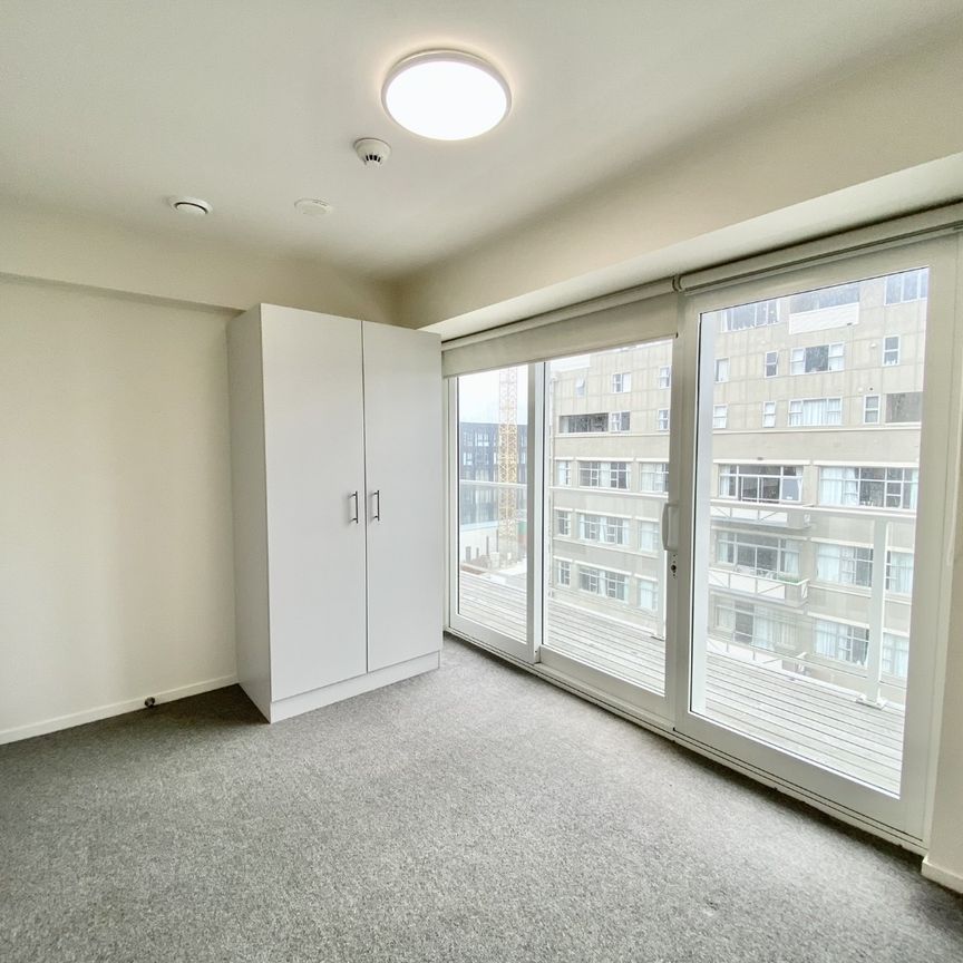 PEAK APARTMENTS - Photo 1