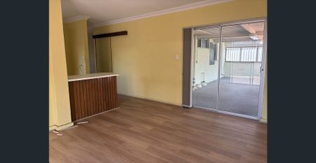 NEW FLOORS IN THE BEDROOMS AND LIVING AREA PLUS A SHED FOR STORAGE! - Photo 2