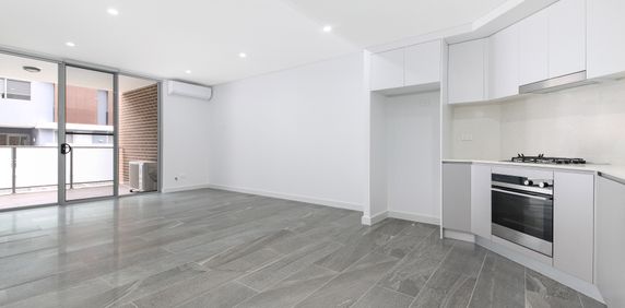 Modern two bedroom unit - 20% below market rent - Photo 2