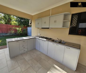 Comfortable Four-Bedroom Living with Solar & Outdoor Entertaining - Photo 4