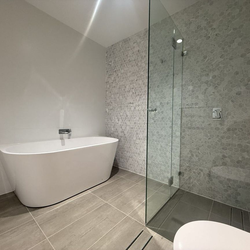 Brand New Contemporary Three-Level Townhouse with Multiple Living Zones - Photo 1