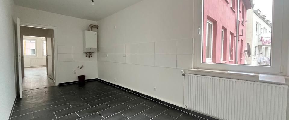 Schöne 2-Zimmer-Wohnung mit großer Küche! - Photo 1