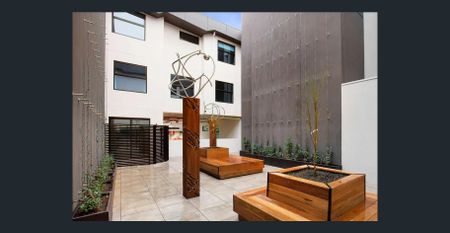 Stylish 2-Bedroom Apartment with Secure Parking in Prime Caufield North Location - Photo 3