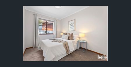 Modern 2-Bedroom Unit with Low-Maintenance Yard - Photo 3