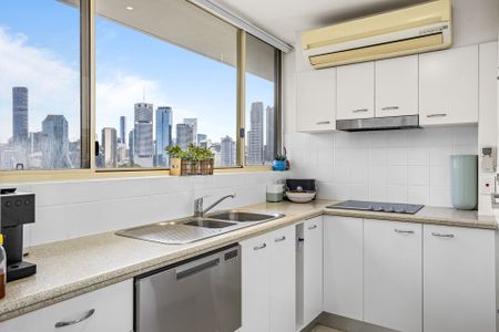 Furnished Riverside Apartment with City Views *Water Bills Included - Photo 5