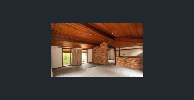 Light-Filled Family Retreat with Multiple Living Areas & Huge Backyard - Photo 1