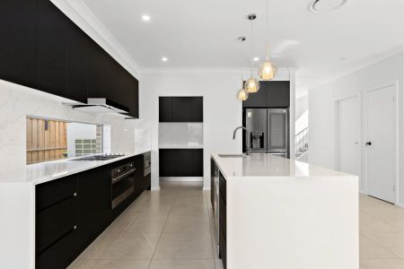 Modern Luxury with Multiple Living Zones & Low-Maintenance Backyard - Photo 3