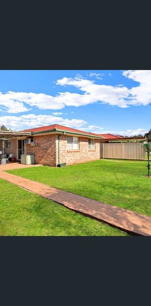 Bright 3-Bedroom Family Home with Large Backyard - Photo 2