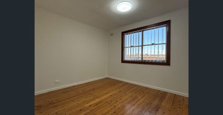 A Stunning Five-Bedroom Family Haven! - Photo 2