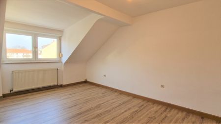Gemütliche Dachgeschosswohnung mit Einbauküche - Foto 5